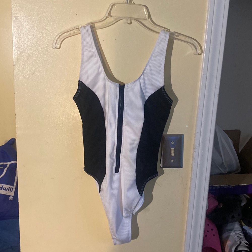 White and black swimsuit from the brand ReVamped